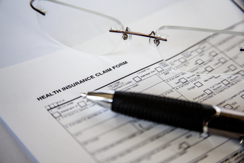 The Cost of Conditioning Care on Work 